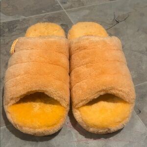 Orange ugg slides